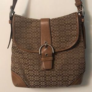 A brown crossbody shoulder bag.